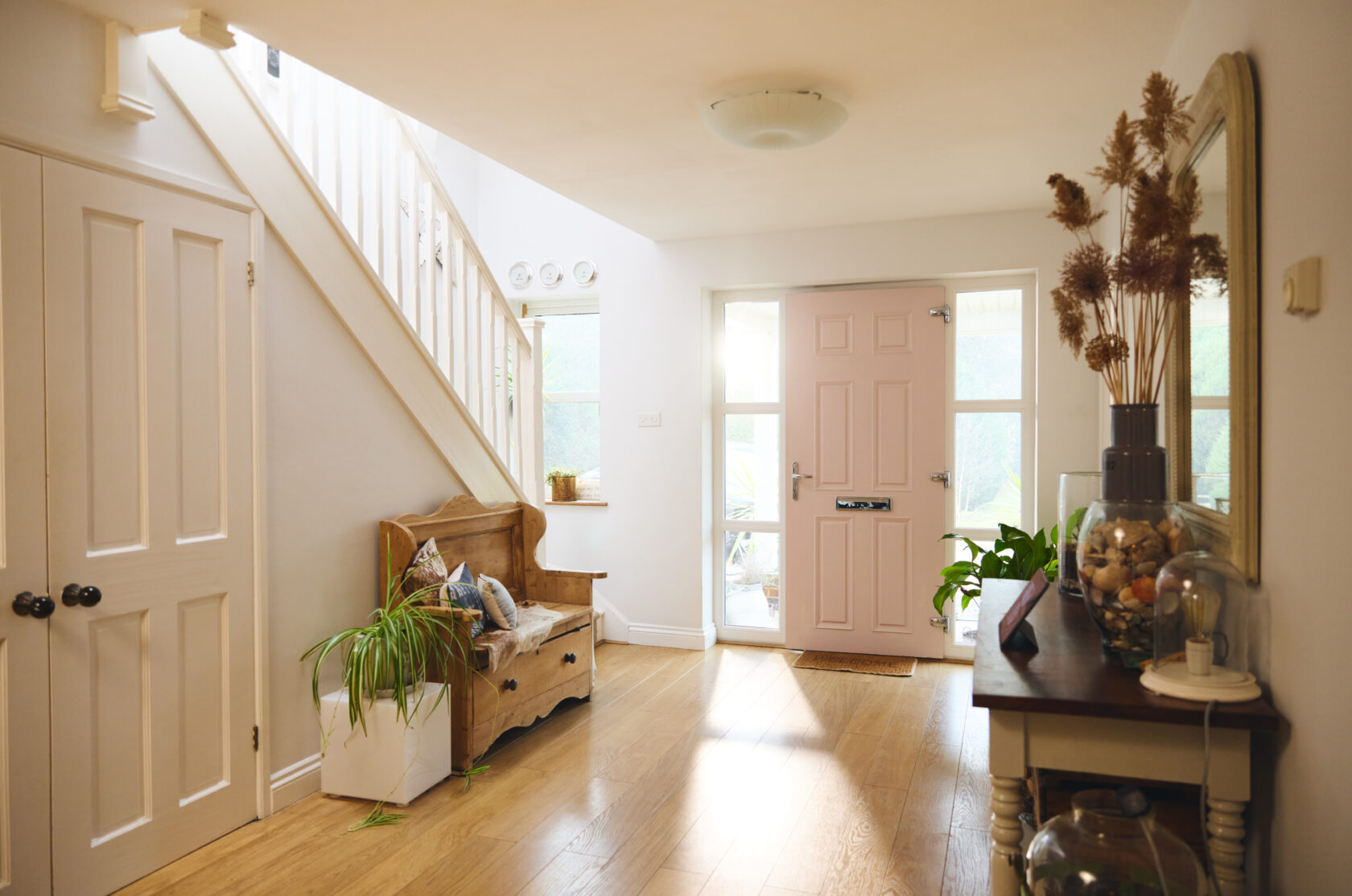 Home interior with hallway and front door